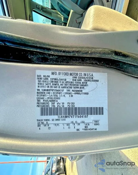 2001 Lincoln Continental z USA, uszkodzony, nr VIN 1LNHM97V71Y604107